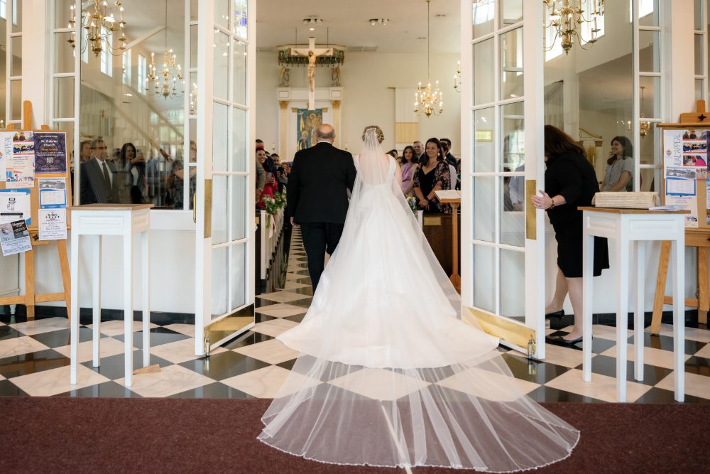 wedding ceremony at St. Gabriel The Archangel Roman Catholic Church