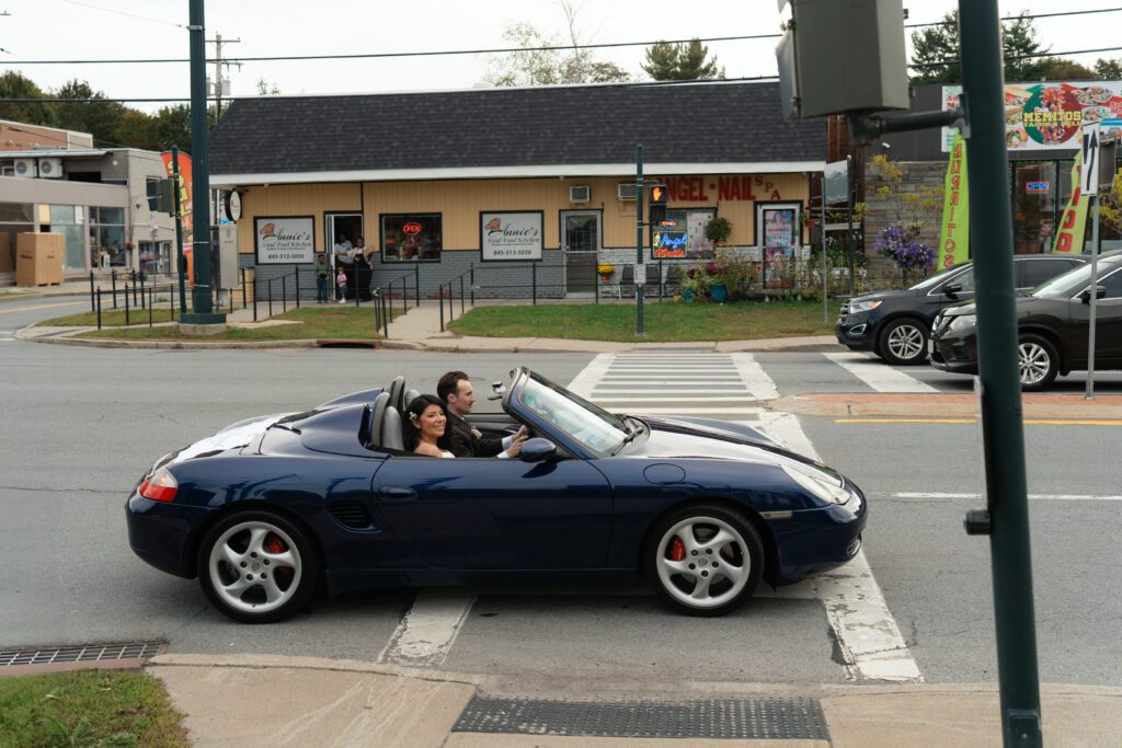 bride and groom leaving wedding ceremony at st peter's church in liberty