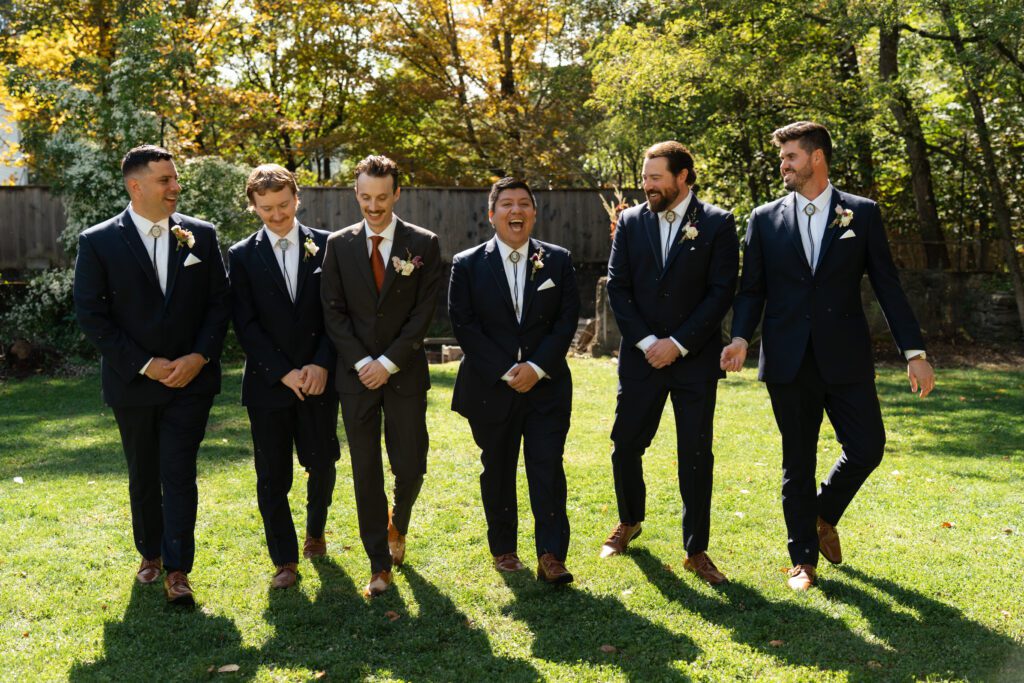 groom and groomsmen outdoor portraits for their north branch inn wedding in the catskills