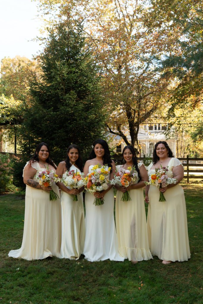 bride and bridesmaids outdoor portraits for their north branch inn wedding in the catskills