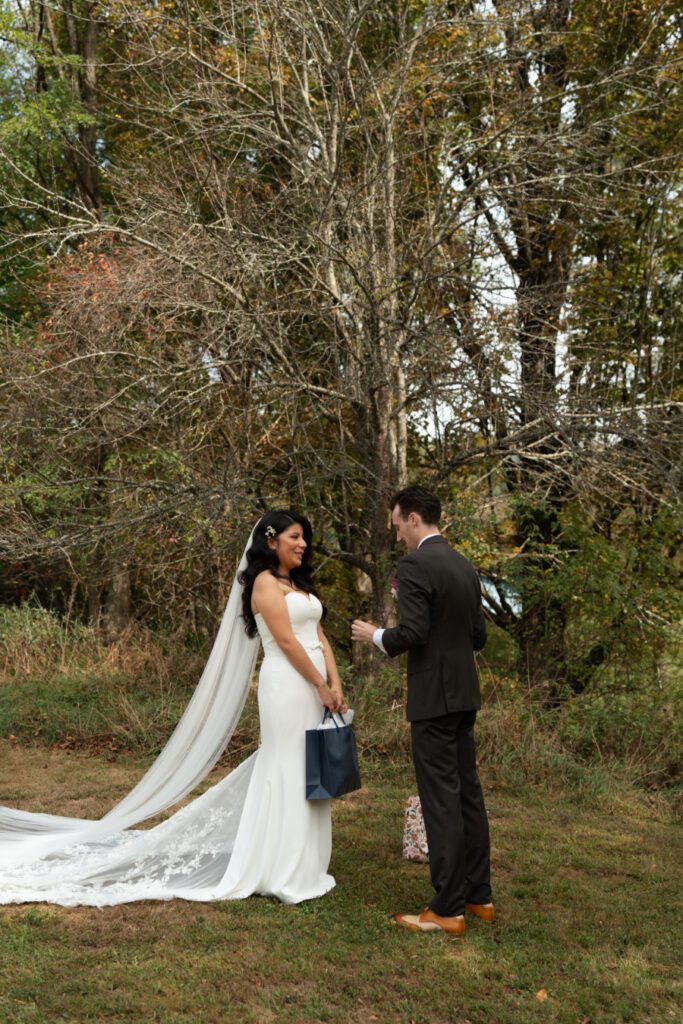 bride and groom outdoor first look portraits for their north branch inn wedding in the catskills