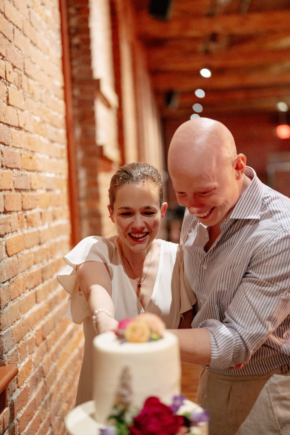 CAKE CUTTING AT WINERY HUDSON VALLEY WEDDING