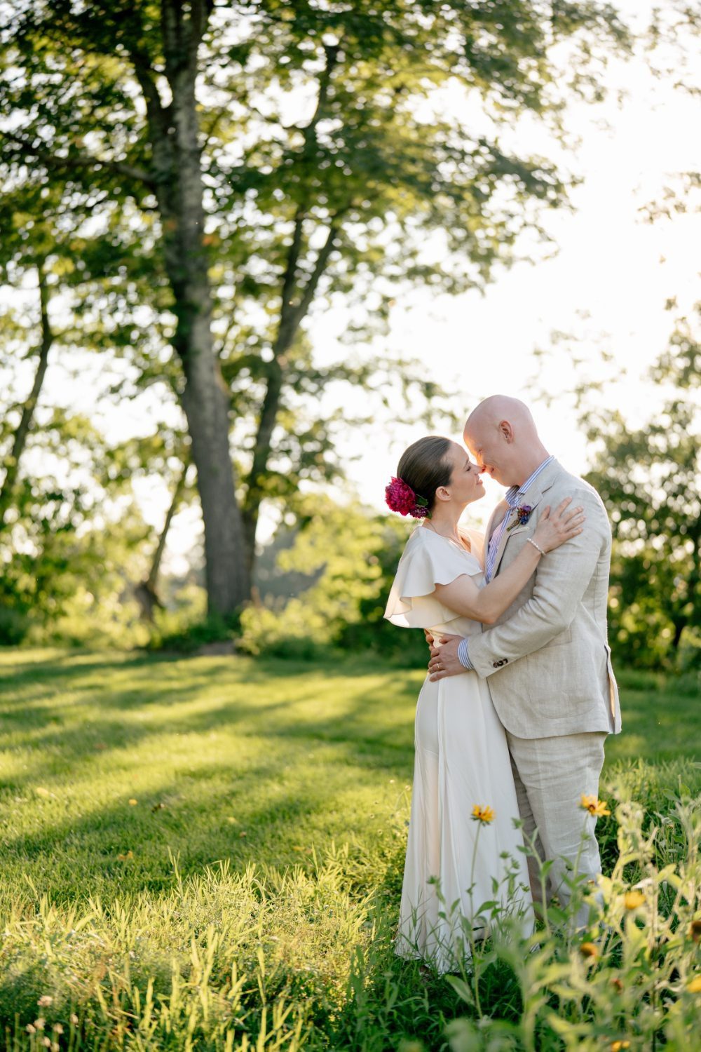 Bride and groom embrace at City Winery Hudson Valley wedding
